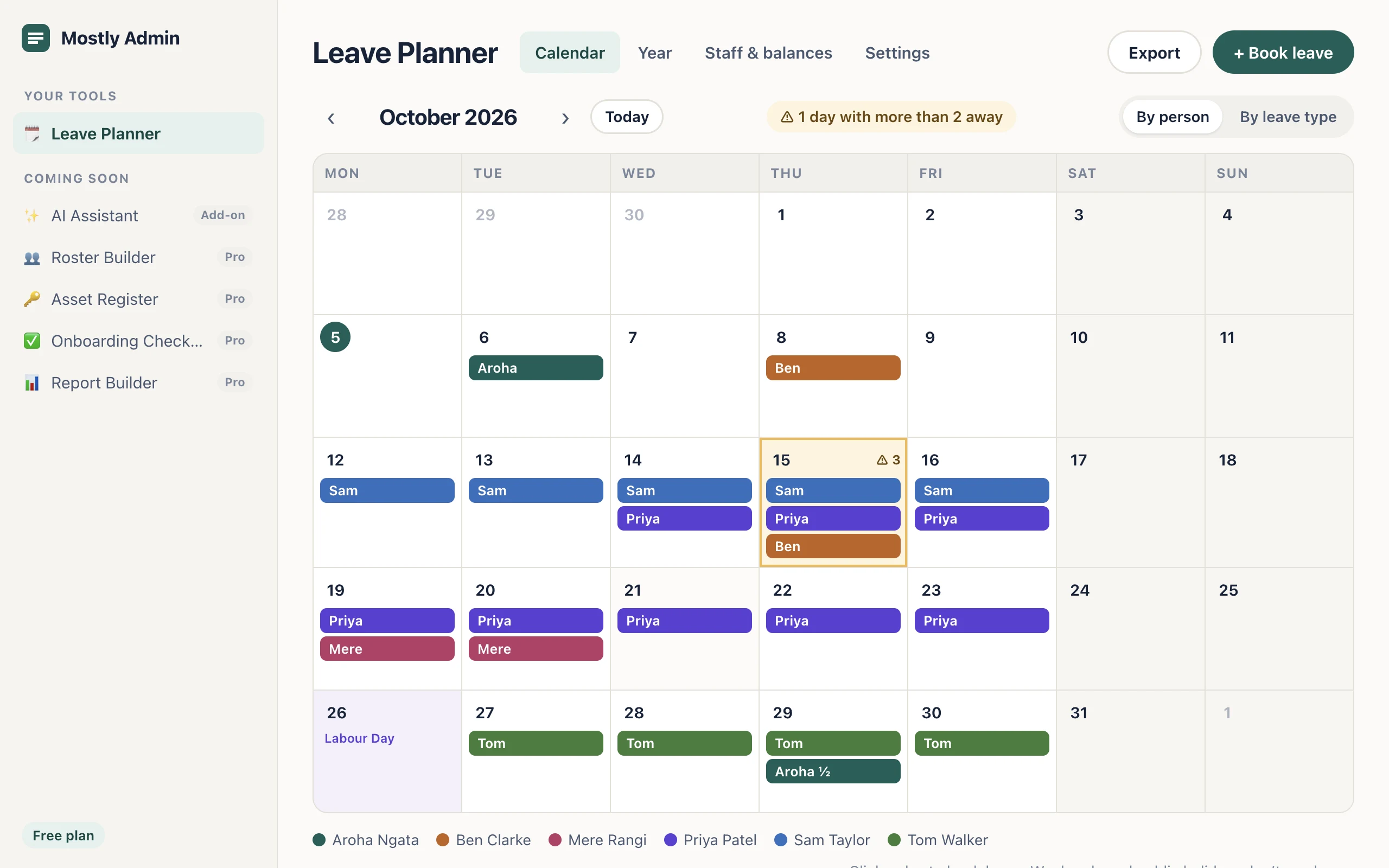 Leave Planner's month calendar, showing who's away each day, Labour Day marked, and a day with too many people away highlighted